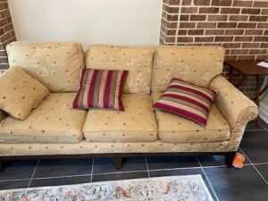 Sherrill sofa,  gold colored fabric with subtle design"